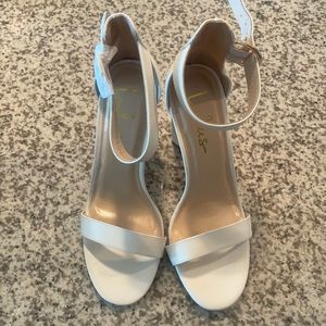 Never worn heeled sandals